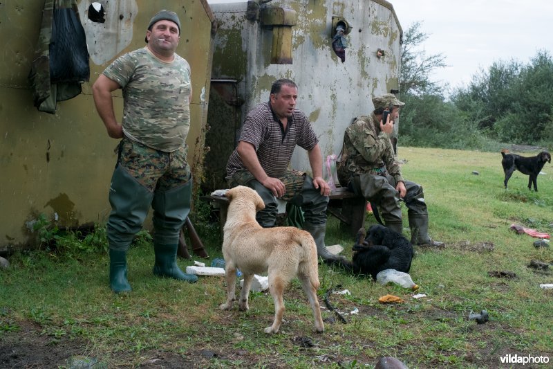 Georgische jagers pauzeren na de jacht