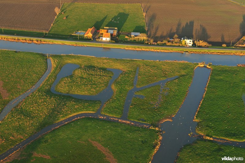 Woumenbroek, IJzer en Houtensluisvaart